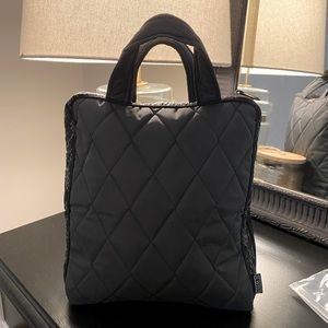 Cinda B toiletries bag